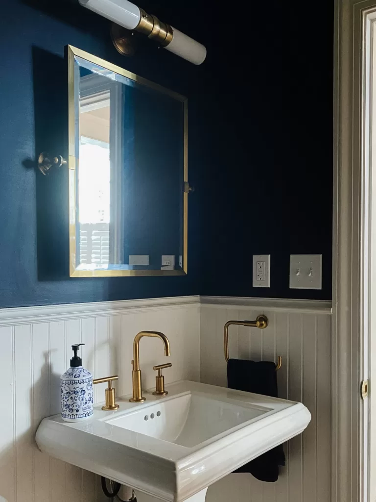 Classic Navy Blue and Gold Powder Room Renovation